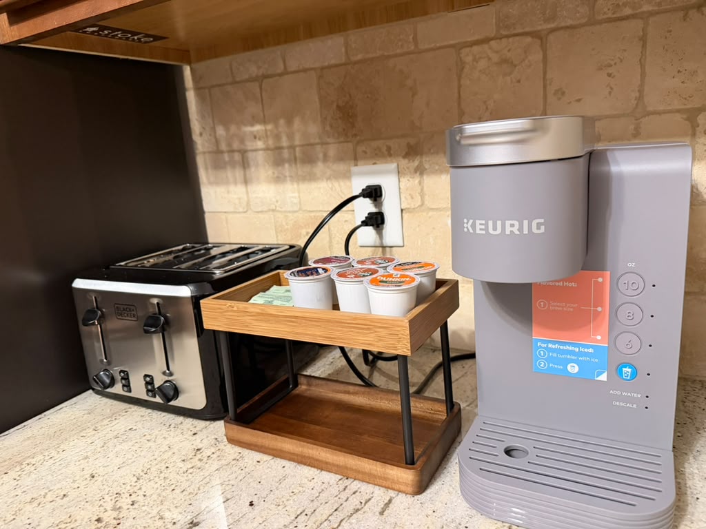 Keurig coffee machine with coffee pods and toaster